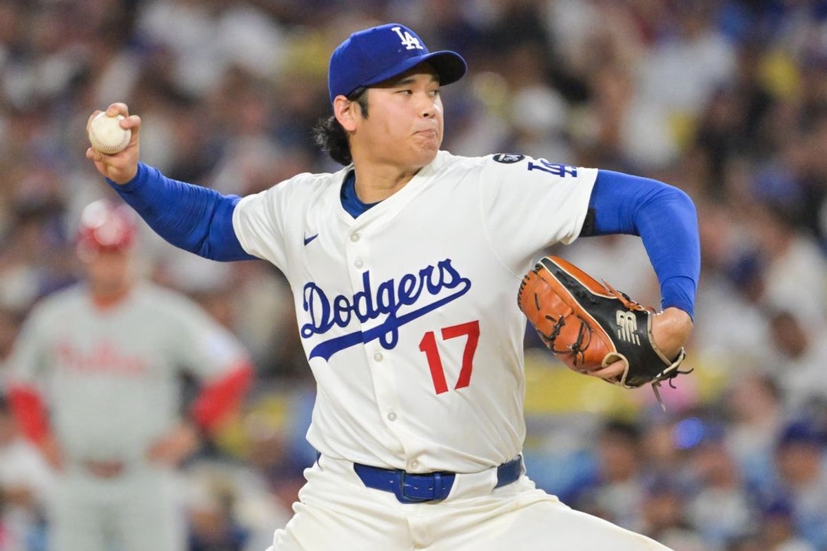Sep 16, 2025; Los Angeles, California, USA; Los Angeles Dodgers two-way player Shohei Ohtani (17) delivers a pitch during the third inning against the Philadelphia Phillies at Dodger Stadium. Mandatory Credit: Jayne Kamin-Oncea-Imagn Images