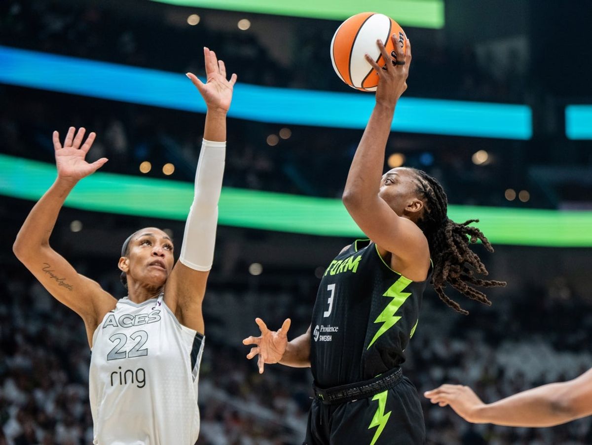 Sep 16, 2025; Seattle, Washington, USA; Seattle Storm forward Nneka Ogwumike (3) shoots the ball against Las Vegas Aces center A'ja Wilson (22) during the first half in game two of round one for the 2025 WNBA Playoffs at Climate Pledge Arena. Mandatory Credit: Stephen Brashear-Imagn Images
