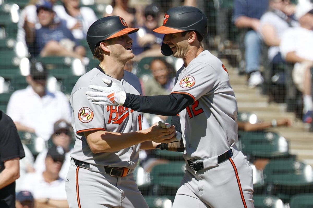 Sep 17, 2025; Chicago, Illinois, USA; Baltimore Orioles left fielder Dylan Beavers (12) celebrates with first baseman Coby Mayo (16) after hitting a two-run home run against the Chicago White Sox during the fourth inning at Rate Field. Mandatory Credit: Kamil Krzaczynski-Imagn Images