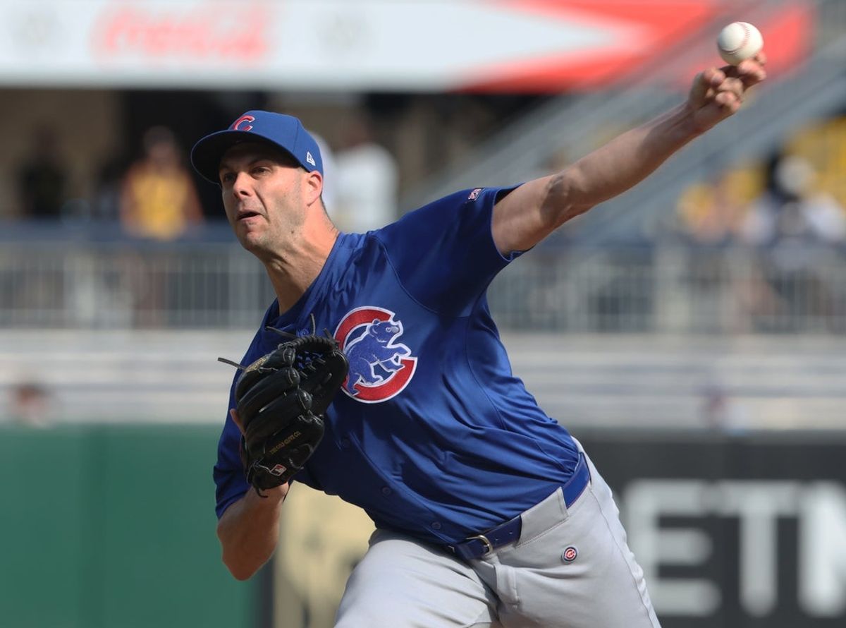 Sep 17, 2025; Pittsburgh, Pennsylvania, USA;  Chicago Cubs relief pitcher Taylor Rogers (17) pitches against the Pittsburgh Pirates during the ninth inning at PNC Park. Mandatory Credit: Charles LeClaire-Imagn Images