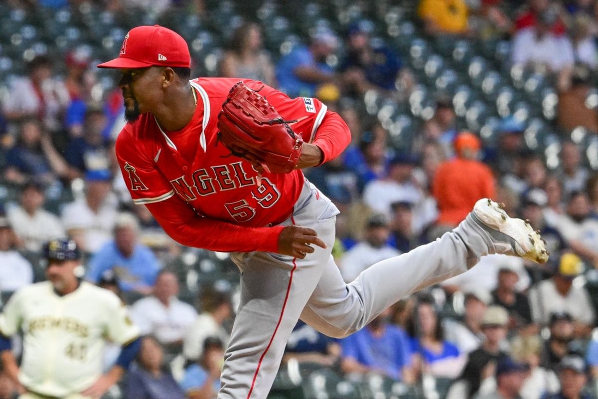 Sep 17, 2025; Milwaukee, Wisconsin, USA;  Los Angeles Angels starting pitcher Jose Soriano (59) throws against the Milwaukee Brewers in the first inning at American Family Field. Mandatory Credit: Benny Sieu-Imagn Images