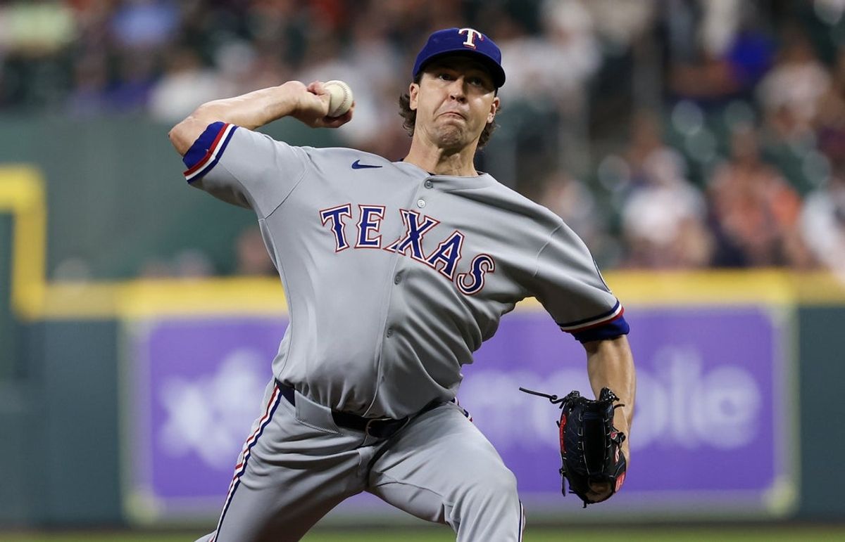 Sep 17, 2025; Houston, Texas, USA; Texas Rangers starting pitcher Jacob deGrom (48) pitches against the Houston Astros in the first inning at Daikin Park. Mandatory Credit: Thomas Shea-Imagn Images