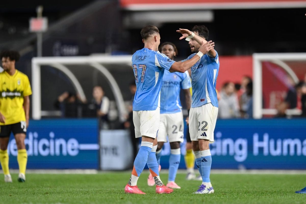 Sep 17, 2025; Bronx, New York, USA; New York City midfielder Hannes Wolf (17) and forward Kevin O'Toole (22) celebrate after winning against the Columbus Crew at Yankee Stadium. Mandatory Credit: John Jones-Imagn Images