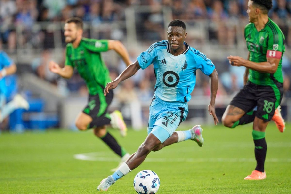 Sep 17, 2025; St. Paul, Minnesota, USA; Minnesota United forward Bongokuhle Hlongwane (21) kicks the ball against Austin FC in the second overtime half at Allianz Field. Mandatory Credit: Matt Blewett-Imagn Images