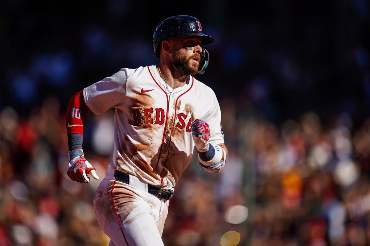 Sep 18, 2025; Boston, Massachusetts, USA; Boston Red Sox shortstop Trevor Story (10) hits a home run against the Athletics in the eighth inning at Fenway Park. Mandatory Credit: David Butler II-Imagn Images