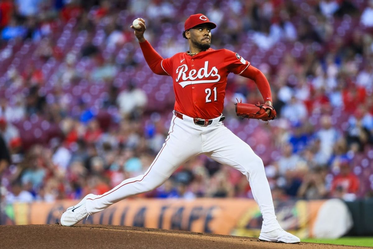 Sep 18, 2025; Cincinnati, Ohio, USA; Cincinnati Reds starting pitcher Hunter Greene (21) pitches against the Chicago Cubs in the first inning at Great American Ball Park. Mandatory Credit: Katie Stratman-Imagn Images
