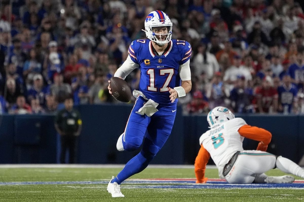 Sep 18, 2025; Orchard Park, New York, USA; Buffalo Bills quarterback Josh Allen (17) runs against the Miami Dolphins in the third quarter at Highmark Stadium. Mandatory Credit: Gregory Fisher-Imagn Images