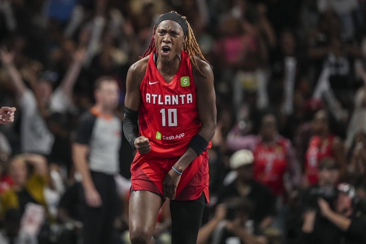 Sep 18, 2025; College Park, Georgia, USA; Atlanta Dream guard Rhyne Howard (10) reacts after making a late three point shot against the Indiana Fever during the second half during game three of round one for the 2025 WNBA Playoffs at Gateway Center Arena at College Park. Mandatory Credit: Dale Zanine-Imagn Images