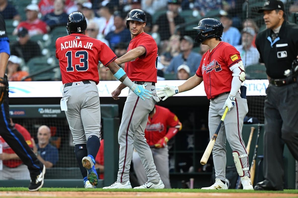 Sep 19, 2025; Detroit, Michigan, USA; Atlanta Braves right fielder Ronald Acuña Jr. (13) celebrates with first baseman Matt Olson (28) and on-deck batter Ha-Seong Kim (right) after they both scored on a single by second baseman Ozzie Albies (not pictured) against the Detroit Tigers in the first inning at Comerica Park. Mandatory Credit: Lon Horwedel-Imagn Images
