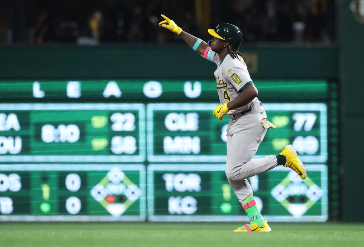 Sep 19, 2025; Pittsburgh, Pennsylvania, USA;  Athletics center fielder Lawrence Butler (4) celebrates as he circles the bases on a three-run home run against the Pittsburgh Pirates during the fifth inning at PNC Park. Mandatory Credit: Charles LeClaire-Imagn Images
