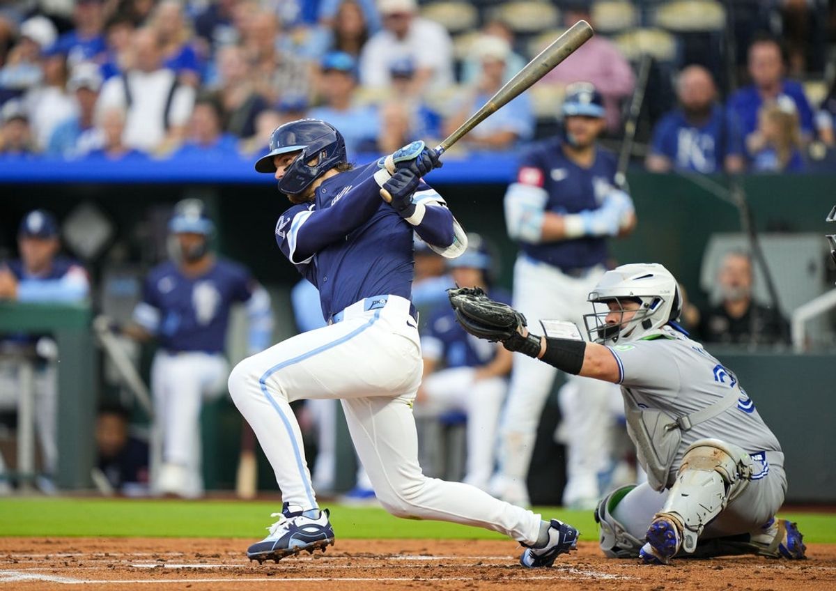 Sep 19, 2025; Kansas City, Missouri, USA; Kansas City Royals shortstop Bobby Witt Jr. (7) hits an RBI single during the first inning against the Toronto Blue Jays at Kauffman Stadium. Mandatory Credit: Jay Biggerstaff-Imagn Images