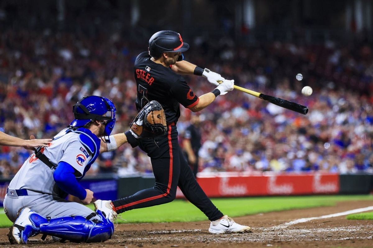Sep 19, 2025; Cincinnati, Ohio, USA; Cincinnati Reds first baseman Spencer Steer (7) hits a solo home run in the sixth inning against the Chicago Cubs at Great American Ball Park. Mandatory Credit: Katie Stratman-Imagn Images