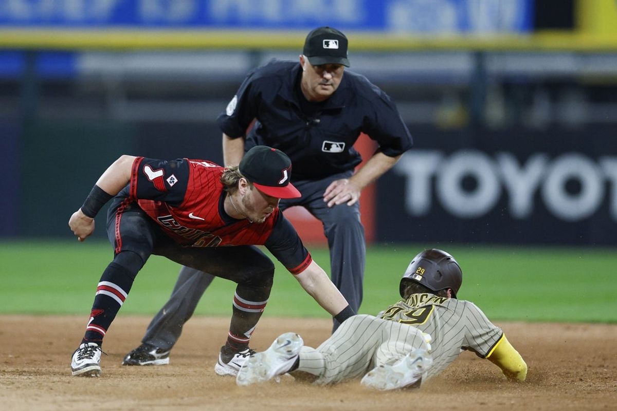 Sep 19, 2025; Chicago, Illinois, USA; San Diego Padres outfielder Bryce Johnson (29) is tagged by Chicago White Sox second baseman Chase Meidroth (10) at second base during the seventh inning at Rate Field. Mandatory Credit: Kamil Krzaczynski-Imagn Images