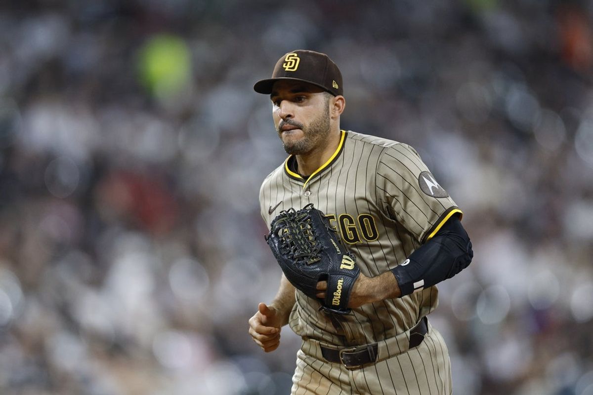 Sep 19, 2025; Chicago, Illinois, USA; San Diego Padres left fielder Ramon Laureano (5) returns to the dugout after the seventh inning of a baseball game against the Chicago White Sox at Rate Field. Mandatory Credit: Kamil Krzaczynski-Imagn Images