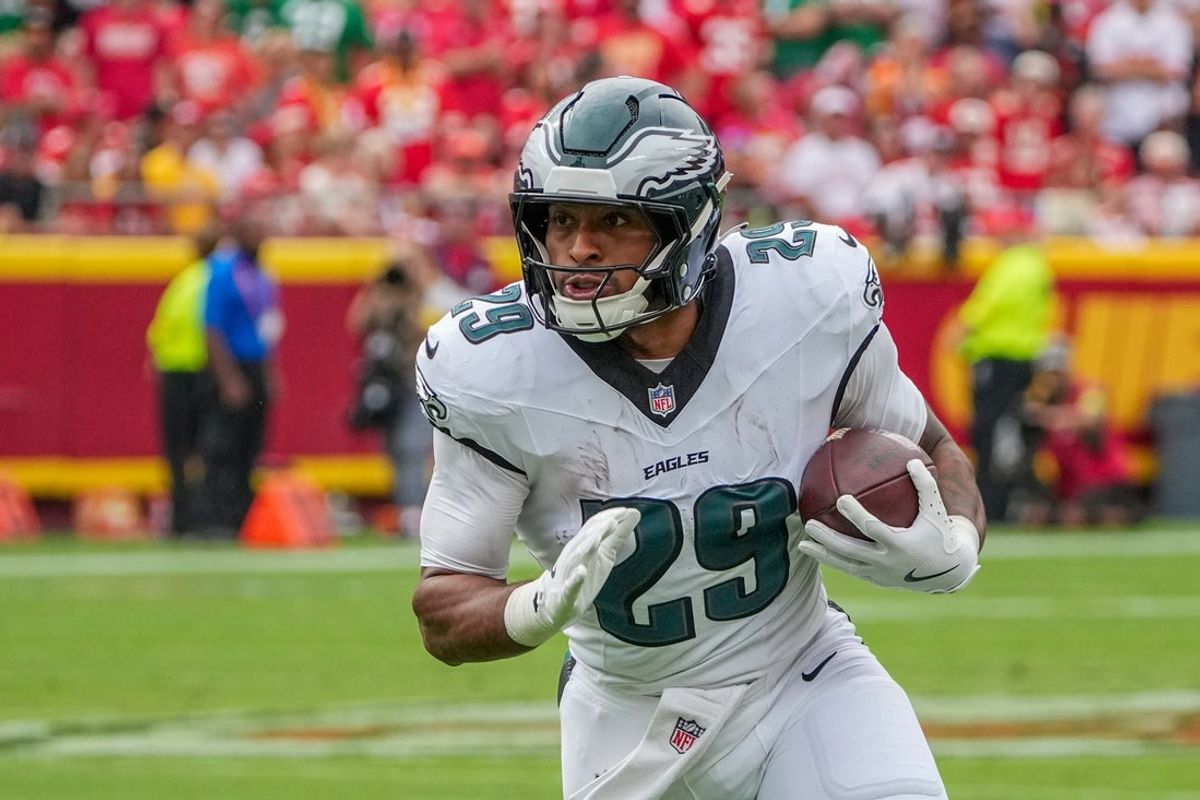 Sep 14, 2025; Kansas City, Missouri, USA; Philadelphia Eagles running back AJ Dillon (29) runs the ball against the Kansas City Chiefs during the game at GEHA Field at Arrowhead Stadium. Mandatory Credit: Denny Medley-Imagn Images