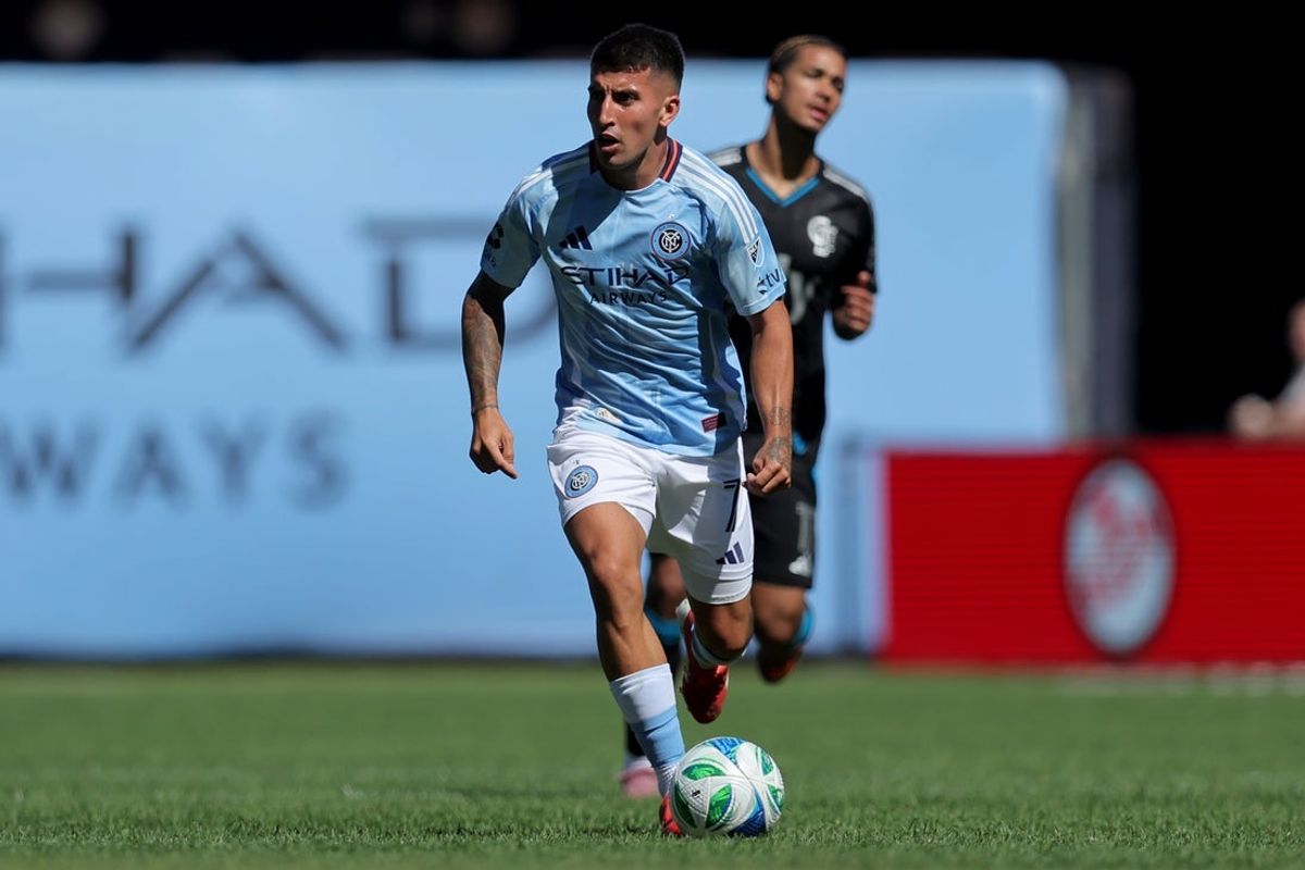 Sep 20, 2025; New York, New York, USA; New York City FC midfielder a(7) brings the ball up the pitch against Charlotte FC during the second half at Yankee Stadium. Mandatory Credit: Brad Penner-Imagn Images