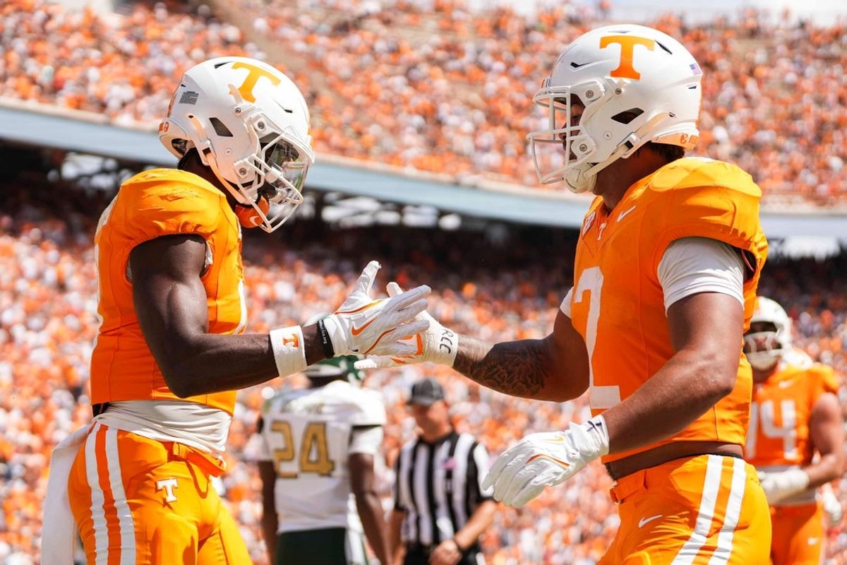 Tennessee wide receiver Mike Matthews (4) celebrates with Tennessee running back Peyton Lewis (2) after Lewis scores a touchdown during a NCAA football game between Tennessee and UAB at Neyland Stadium in Knoxville, Tenn., September 20, 2025.