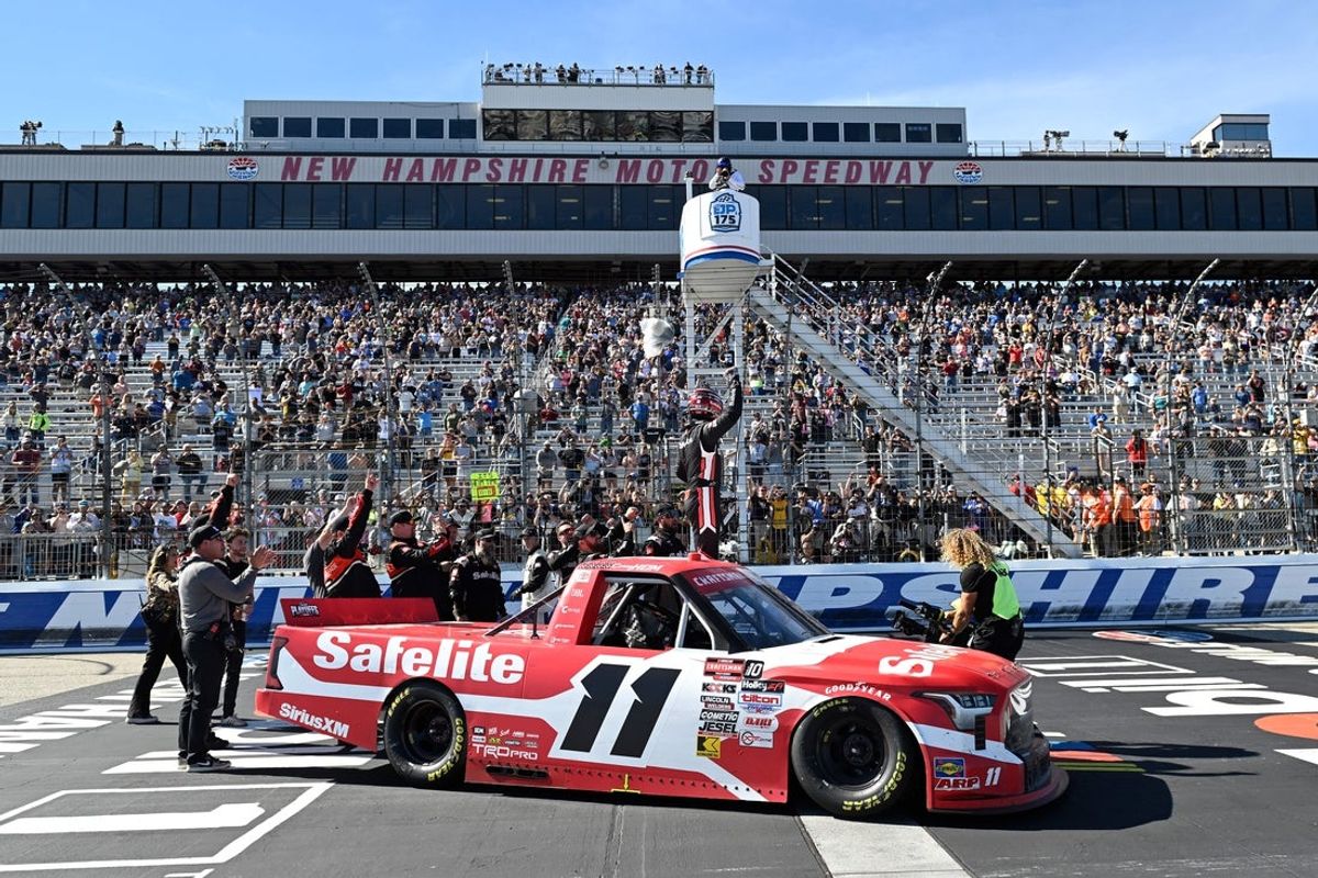 Sep 20, 2025; Loudon, New Hampshire, USA; NASCAR Craftsman Truck Series driver Corey Heim (11) celebrates winning the Team EJP 175 race at New Hampshire Motor Speedway. Mandatory Credit: Eric Canha-Imagn Images
