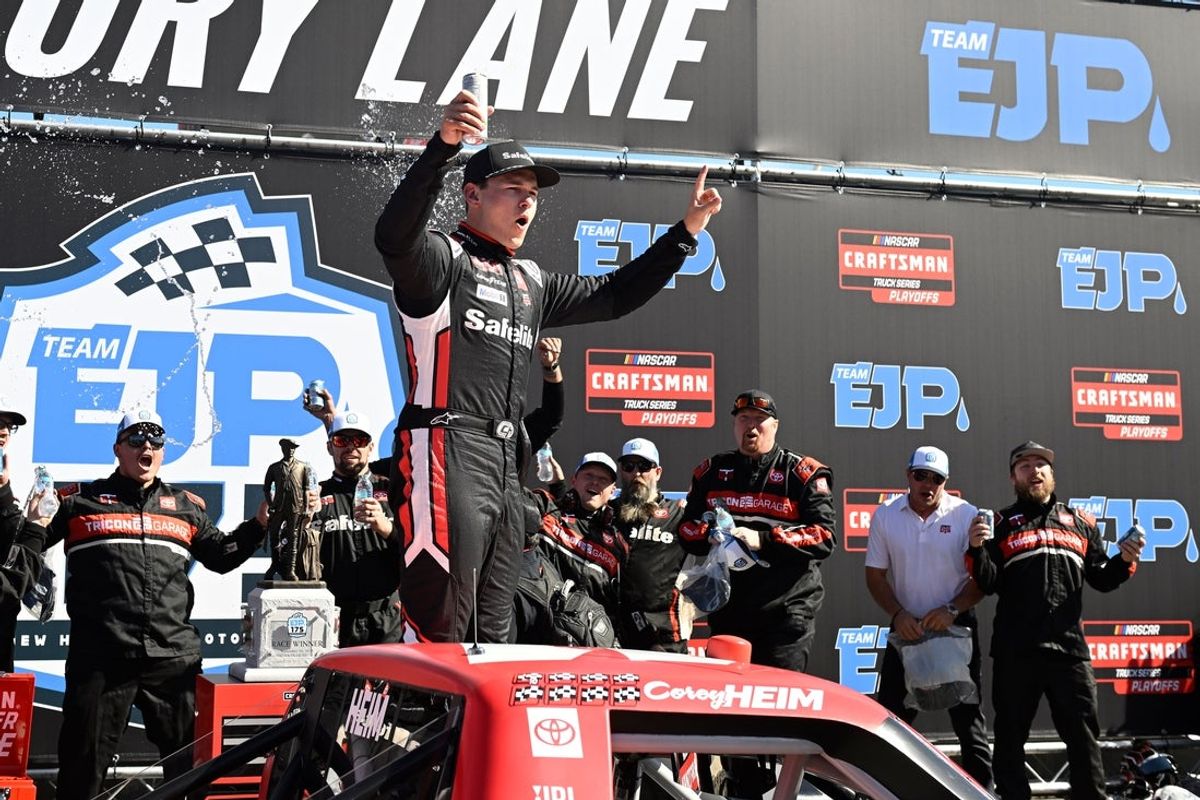 Sep 20, 2025; Loudon, New Hampshire, USA; NASCAR Craftsman Truck Series driver Corey Heim (11) celebrates winning the Team EJP 175 race at New Hampshire Motor Speedway. Mandatory Credit: Eric Canha-Imagn Images