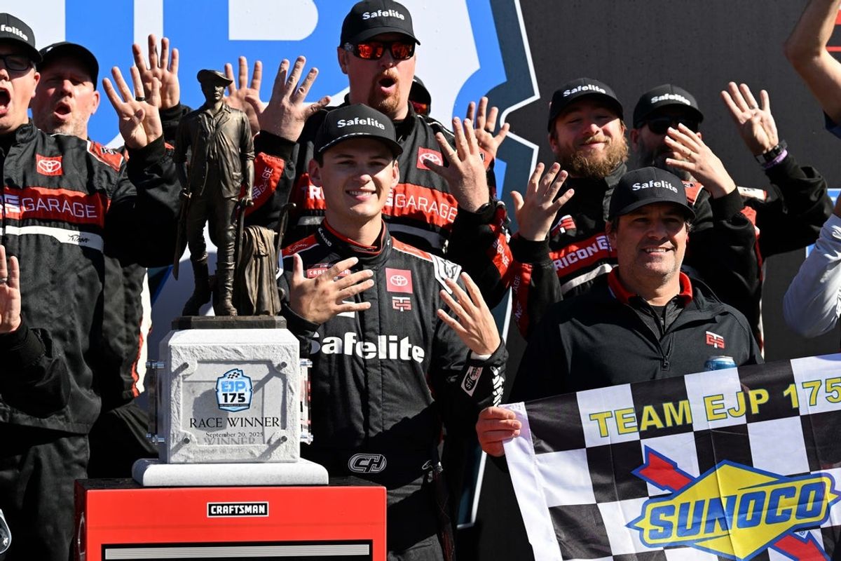 Sep 20, 2025; Loudon, New Hampshire, USA; NASCAR Craftsman Truck Series driver Corey Heim (11) celebrates winning the Team EJP 175 race at New Hampshire Motor Speedway. Mandatory Credit: Eric Canha-Imagn Images