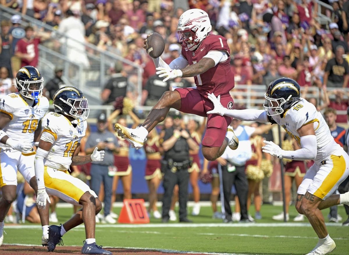 Sep 20, 2025; Tallahassee, Florida, USA; Florida State Seminoles quarterback Thomas Castellanos (1) scores a touchdown during the first half against the Kent State Golden Flashes at Doak S. Campbell Stadium. Mandatory Credit: Melina Myers-Imagn Images