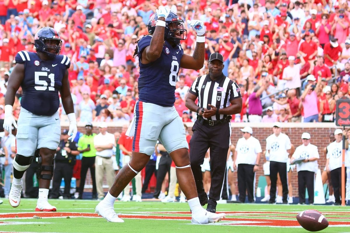 Sep 20, 2025; Oxford, Mississippi, USA; Mississippi Rebels tight end Dae'Quan Wright (8) reacts after a touchdown during the first quarter against the Tulane Green Wave at Vaught-Hemingway Stadium. Mandatory Credit: Petre Thomas-Imagn Images