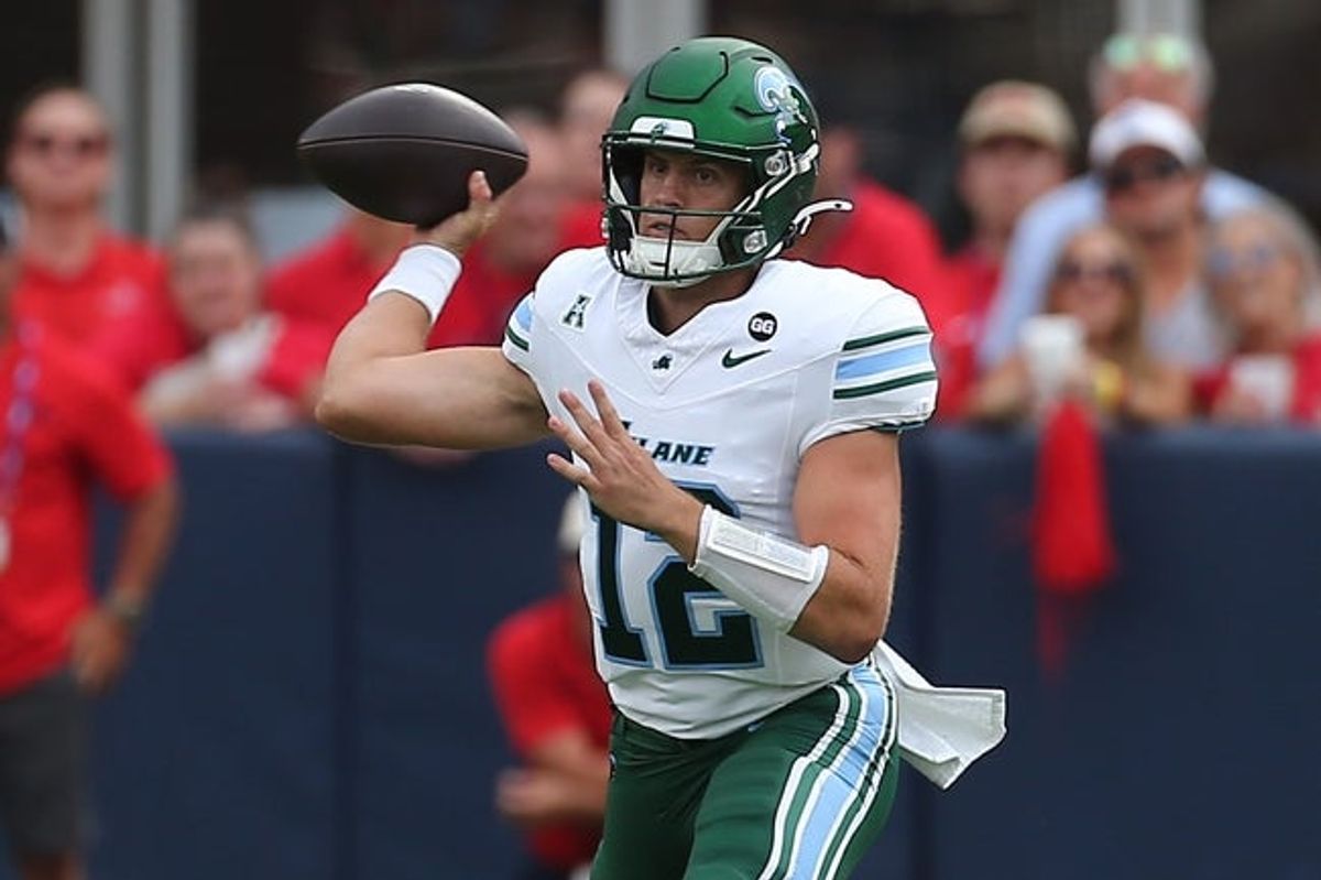 Sep 20, 2025; Oxford, Mississippi, USA; Tulane Green Wave quarterback Jake Retzlaff (12) passes the ball during the first quarter against the Mississippi Rebels at Vaught-Hemingway Stadium. Mandatory Credit: Petre Thomas-Imagn Images