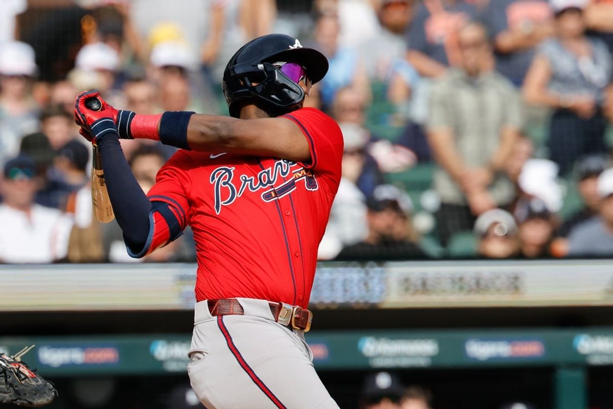 Sep 20, 2025; Detroit, Michigan, USA; Atlanta Braves outfielder Jurickson Profar (7) hits an RBI single in the eighth inning against the Detroit Tigers at Comerica Park. Mandatory Credit: Rick Osentoski-Imagn Images