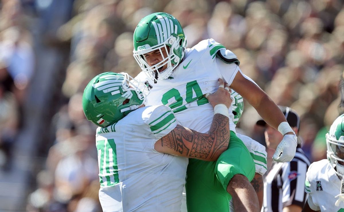 Sep 20, 2025; West Point, New York, USA; North Texas Mean Green running back Caleb Hawkins (24) celebrates his touchdown against the Army Black Knights during the second half at Michie Stadium. Mandatory Credit: Danny Wild-Imagn Images