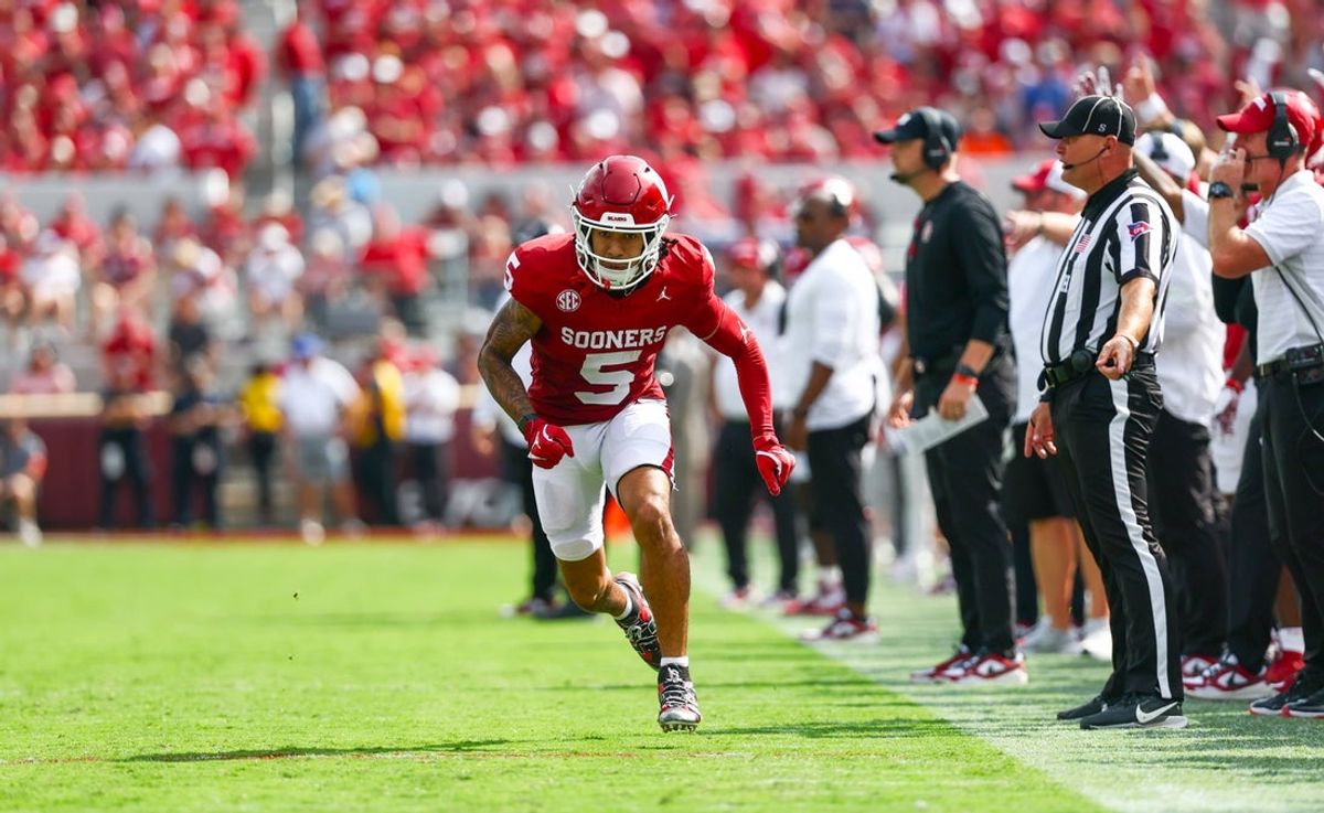 Sep 20, 2025; Norman, Oklahoma, USA;  Oklahoma Sooners wide receiver Isaiah Sategna III (5) is left uncovered during the first half against the Auburn Tigers at Gaylord Family-Oklahoma Memorial Stadium. Mandatory Credit: Kevin Jairaj-Imagn Images