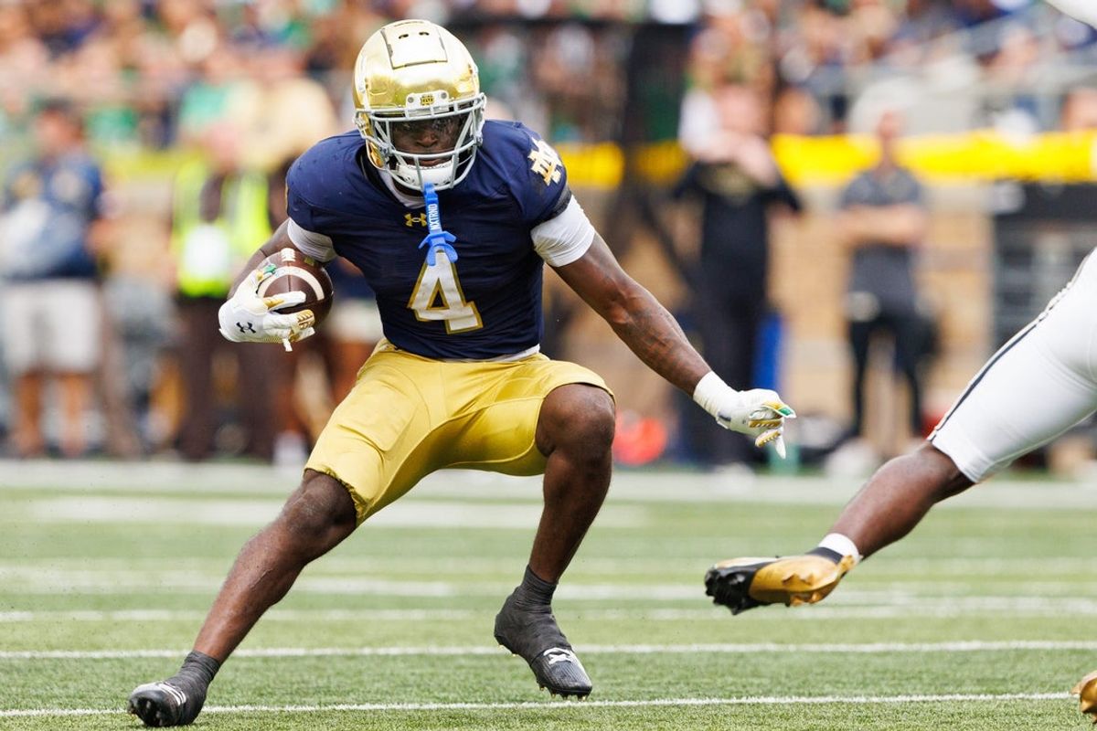 Notre Dame running back Jeremiyah Love (4) runs with the ball during the first half of a NCAA football game against Purdue at Notre Dame Stadium on Saturday, Sept. 20, 2025, in South Bend.