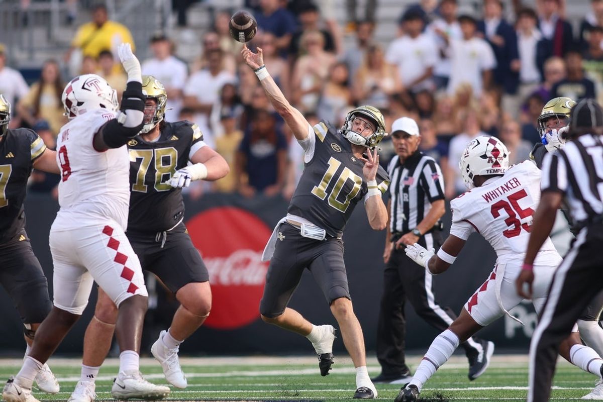 Sep 20, 2025; Atlanta, Georgia, USA; Georgia Tech Yellow Jackets quarterback Haynes King (10) throws a pass against the Temple Owls in the first quarter at Bobby Dodd Stadium at Hyundai Field. Mandatory Credit: Brett Davis-Imagn Images