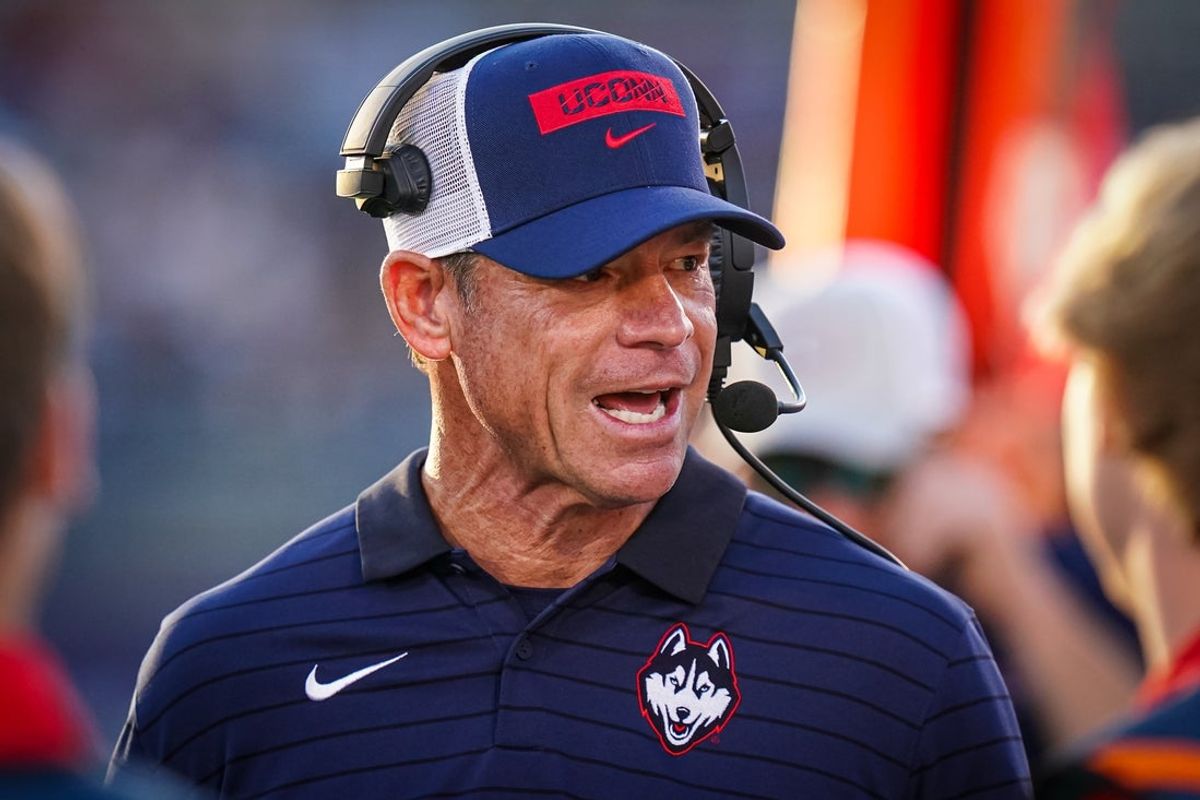 Sep 20, 2025; East Hartford, Connecticut, USA; Connecticut Huskies head coach Jim Mora watches from the sideline as they take on the Ball State Cardinals at Pratt & Whitney Stadium at Rentschler Field. Mandatory Credit: David Butler II-Imagn Images