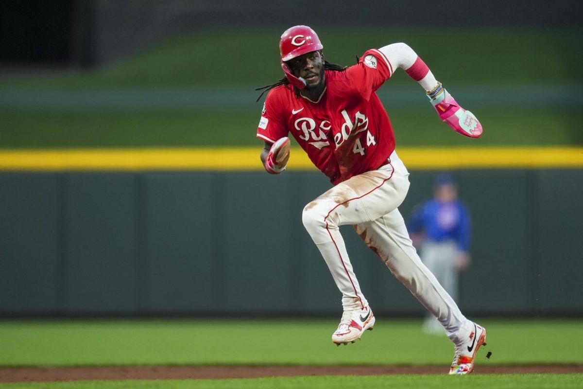 Sep 20, 2025; Cincinnati, Ohio, USA; Cincinnati Reds shortstop Elly De La Cruz (44) advances to third base on a wild pitch by Chicago Cubs pitcher Javier Assad (72) in the second inning at Great American Ball Park. Mandatory Credit: Aaron Doster-Imagn Images