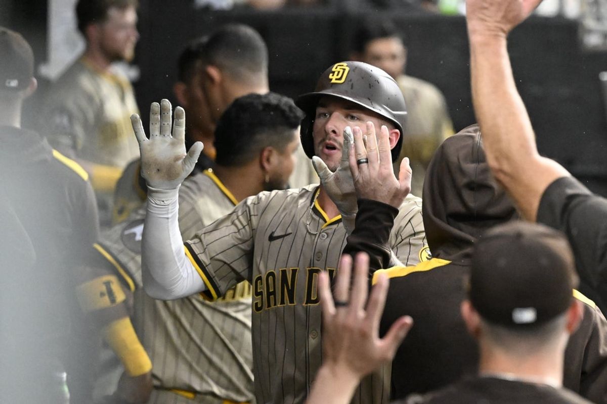 Sep 20, 2025; Chicago, Illinois, USA;  San Diego Padres outfielder Jackson Merrill (3) celebrates in the dugout after his home run during the second inning against the Chicago White Sox at Rate Field. Mandatory Credit: Matt Marton-Imagn Images
