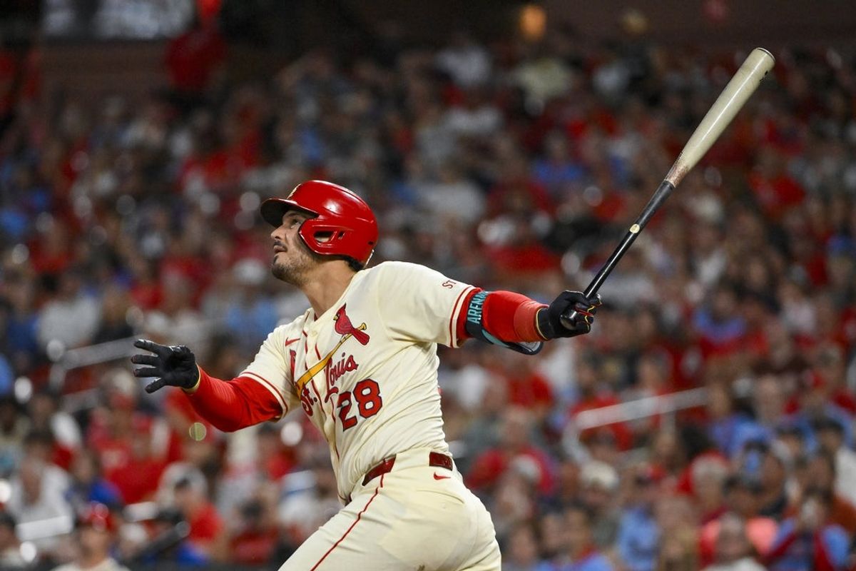 Sep 20, 2025; St. Louis, Missouri, USA; St. Louis Cardinals third baseman Nolan Arenado (28) hits a one run single against the Milwaukee Brewers during the fourth inning at Busch Stadium. Mandatory Credit: Jeff Curry-Imagn Images