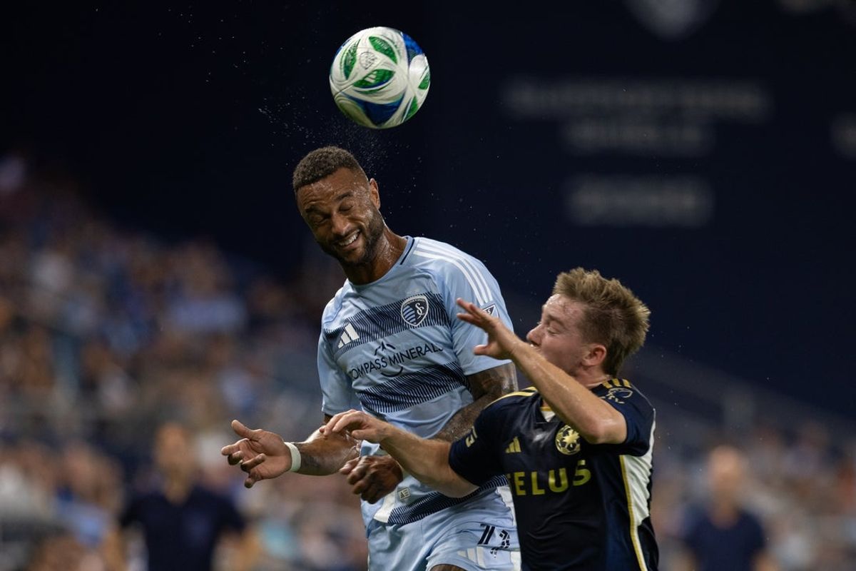Sep 20, 2025; Kansas City, Kansas, USA; Sporting Kansas City forward Khiry Shelton (11) heads the ball during the match against Vancouver at Children's Mercy Park. Mandatory Credit: Kylie Graham-Imagn Images