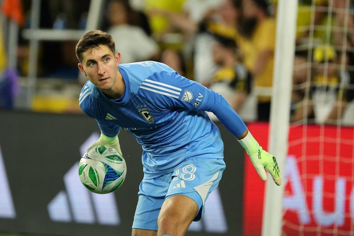 Sep 20, 2025; Columbus, Ohio, USA;  Columbus Crew goalkeeper Patrick Schulte (28) passes the ball during the second half against the Toronto FC at Lower.com Field. Mandatory Credit: Joseph Maiorana-Imagn Images