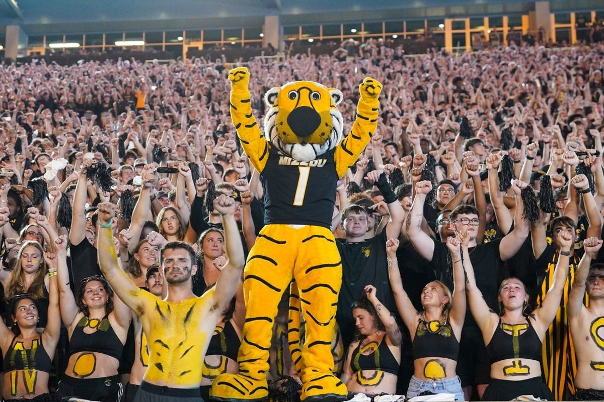 Sep 20, 2025; Columbia, Missouri, USA; The Missouri Tigers mascot Truman celebrates with fans against the South Carolina Gamecocks during the second half of the game at Faurot Field at Memorial Stadium. Mandatory Credit: Denny Medley-Imagn Images