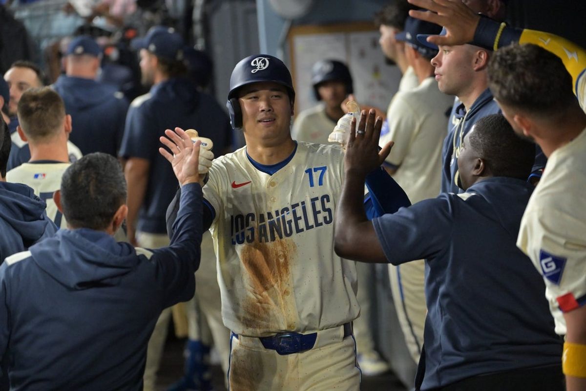 Sep 20, 2025; Los Angeles, California, USA; Los Angeles Dodgers two-way player Shohei Ohtani (17) scores during the third inning after the game at Dodger Stadium. Mandatory Credit: Jayne Kamin-Oncea-Imagn Images
