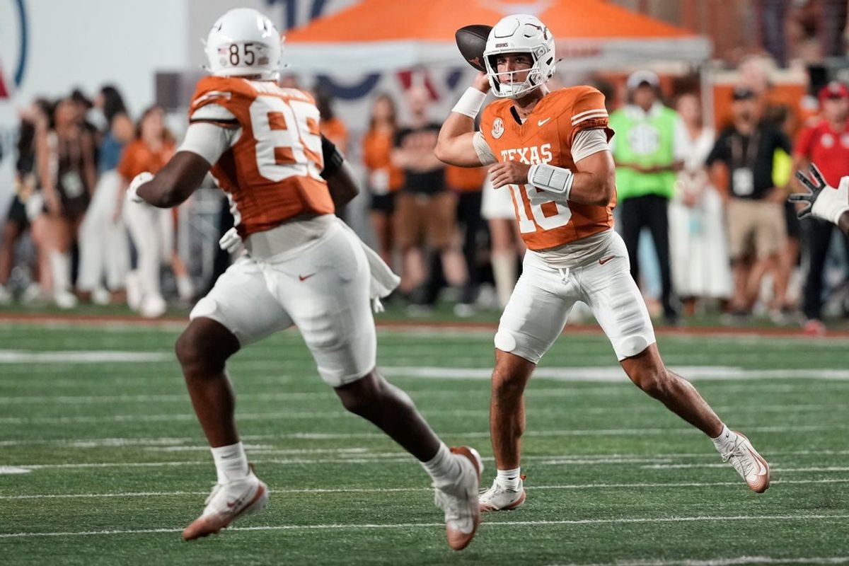 Sep 20, 2025; Austin, Texas, USA; Texas Longhorns quarterback Matthew Caldwell (18) throws a pass during the second half against the Sam Houston Bearkats at Darrell K Royal-Texas Memorial Stadium. Mandatory Credit: Scott Wachter-Imagn Images