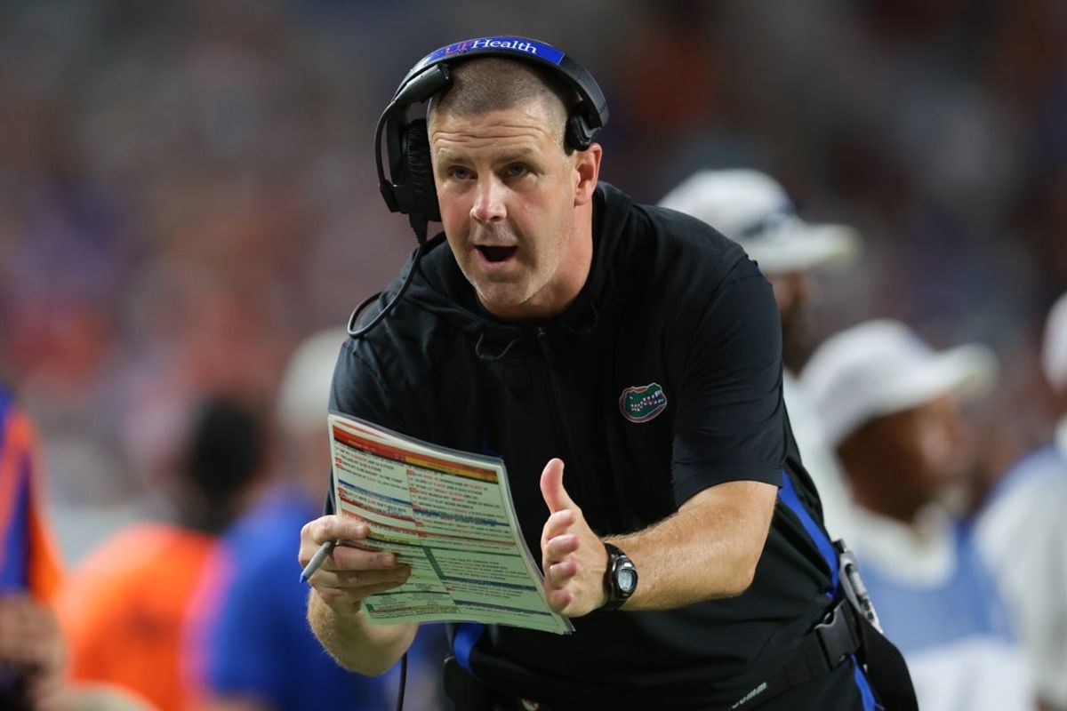 Sep 20, 2025; Miami Gardens, Florida, USA; Florida Gators head coach Billy Napier call for a timeout against the Miami Hurricanes during the fourth quarter at Hard Rock Stadium. Mandatory Credit: Sam Navarro-Imagn Images