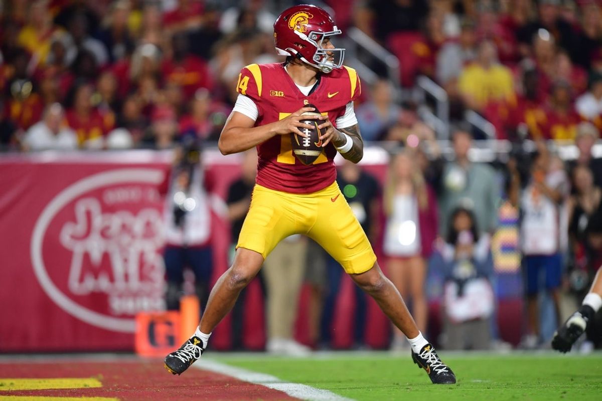 Sep 20, 2025; Los Angeles, California, USA; Southern California Trojans quarterback Jayden Maiava (14) drops back to pass against the Michigan State Spartans during the first half at the Los Angeles Memorial Coliseum. Mandatory Credit: Gary A. Vasquez-Imagn Images