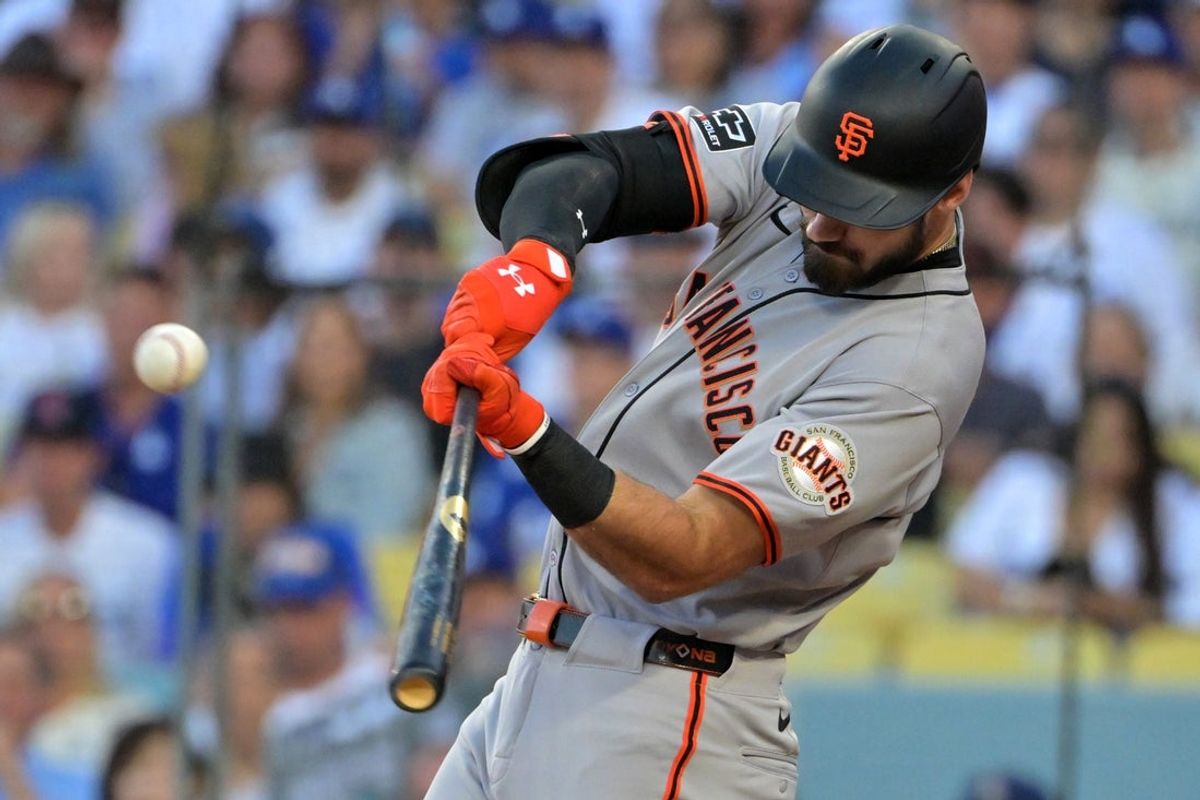 Sep 20, 2025; Los Angeles, California, USA;  San Francisco Giants first baseman Bryce Eldridge (78) doubles in three runs in the first inning against the Los Angeles Dodgers at Dodger Stadium. Mandatory Credit: Jayne Kamin-Oncea-Imagn Images