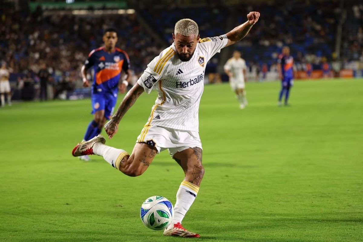 Sep 20, 2025; Carson, California, USA;  LA Galaxy midfielder Diego Fagundez (7) kicks the ball during the second half against FC Cincinnati at Dignity Health Sports Park. Mandatory Credit: Kiyoshi Mio-Imagn Images