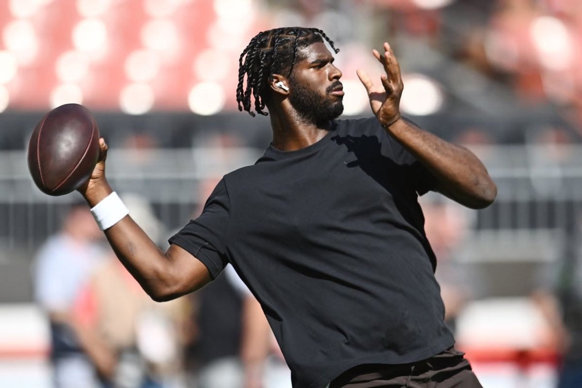 Sep 21, 2025; Cleveland, Ohio, USA; Cleveland Browns quarterback Shedeur Sanders (12) warms up before the game between the Browns and the Green Bay Packers at Huntington Bank Field. Mandatory Credit: Ken Blaze-Imagn Images