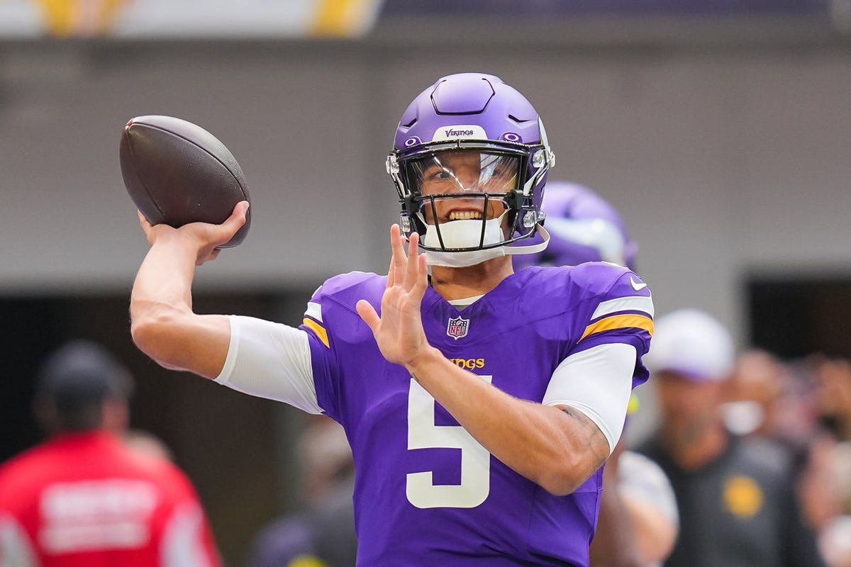 Sep 21, 2025; Minneapolis, Minnesota, USA; Minnesota Vikings quarterback Desmond Ridder (5) warms up prior to a game against the Cincinnati Bengals at U.S. Bank Stadium. Mandatory Credit: Brad Rempel-Imagn Images