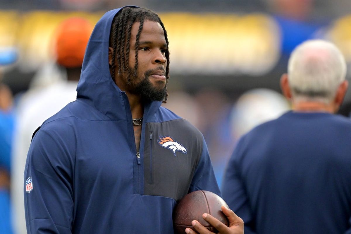Sep 21, 2025; Inglewood, California, USA;  Denver Broncos linebacker Dre Greenlaw (57) on the sidelines prior to the game against the Los Angeles Chargers at SoFi Stadium. Mandatory Credit: Jayne Kamin-Oncea-Imagn Images