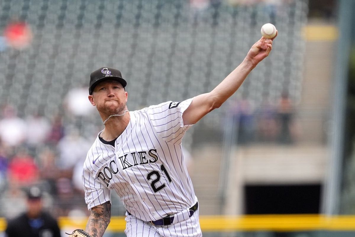 Sep 21, 2025; Denver, Colorado, USA; Colorado Rockies starting pitcher Kyle Freeland (21) delivers a ball in the first inning against the Los Angeles Angels at Coors Field. Mandatory Credit: Ron Chenoy-Imagn Images