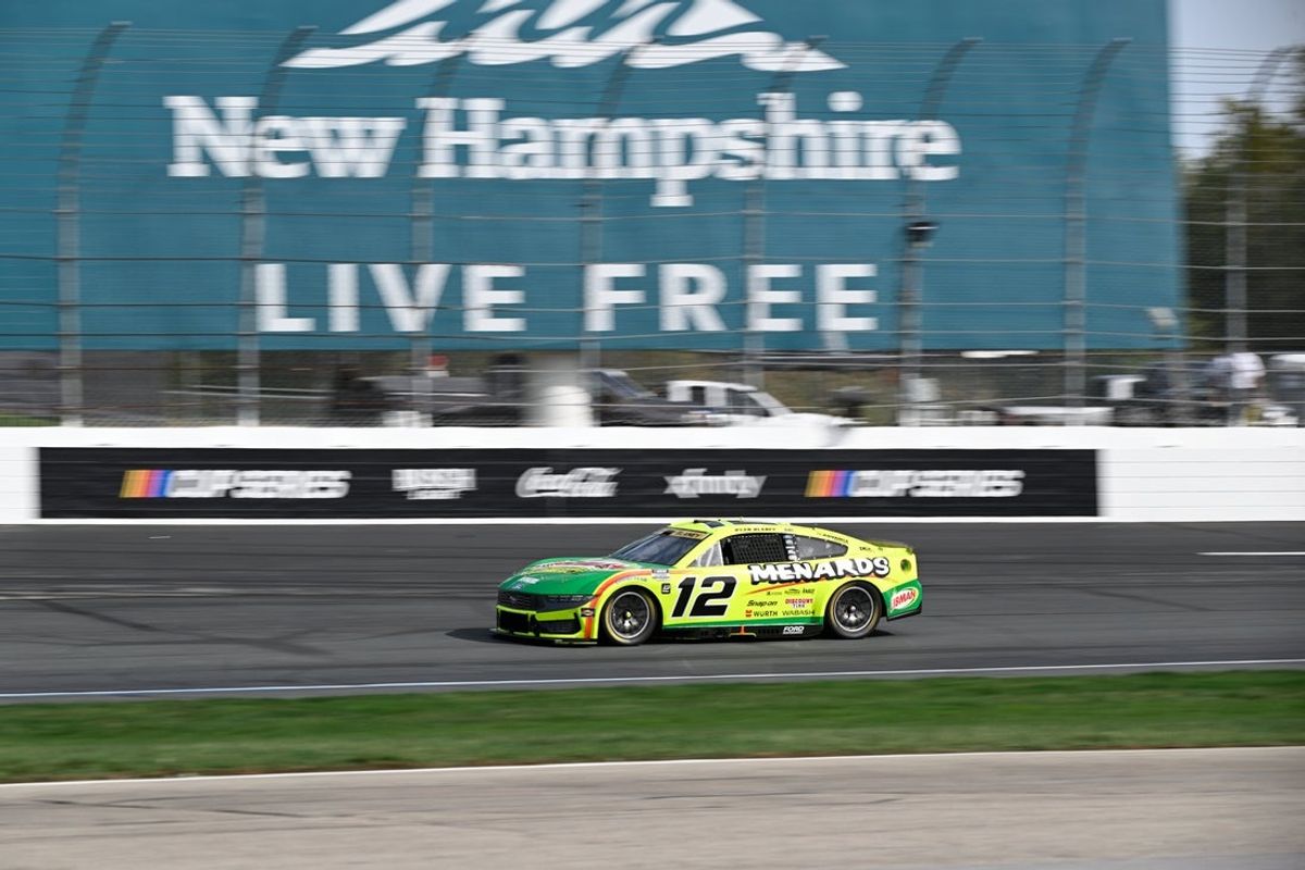 Sep 21, 2025; Loudon, New Hampshire, USA; NASCAR Cup Series driver Ryan Blaney (12) races during the Mobil 1 301 at New Hampshire Motor Speedway. Mandatory Credit: Eric Canha-Imagn Images